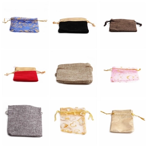Custom drawstring gift bags in velvet and linen textures with gold foil printed patterns
