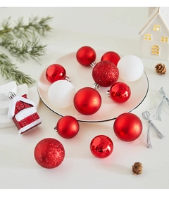 Detail of red and white Christmas ornaments set with glitter and velvet textures