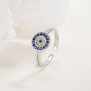 Adjustable S925 silver ring with blue and white evil eye charm and crystal inlays
