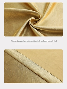 Detailed close-up of golden European luxury curtain fabric with elegant damask texture