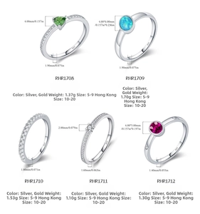 Collection of S925 sterling silver rings with emerald, opal, and ruby gemstone details