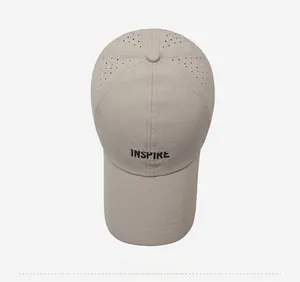 Detailed top view of breathable laser-cut vents and Inspire embroidery on baseball cap