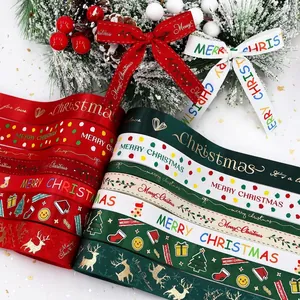 Various Christmas ribbons with gold Merry Christmas lettering and festive holiday patterns