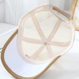 Detailed interior of a breathable mesh baseball cap for kids with adjustable velcro strap