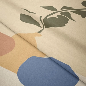 Détail d'une tapisserie bohème montrant la texture douce du tissu et les motifs géométriques
