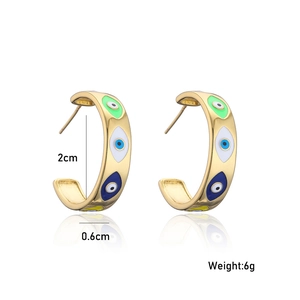 Detailed view of 2cm gold-plated C-shape hoop earrings with colorful evil eye enamel design