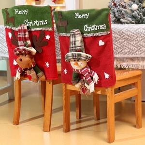 Christmas chair covers featuring 3D Santa and snowman dolls for festive dining decor