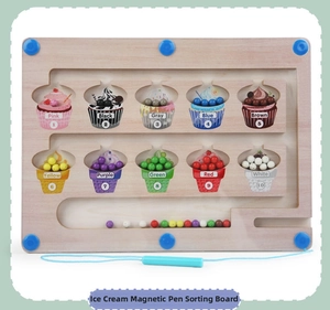 Close-up of wooden magnetic ice cream sorting board with colored beads and stylus