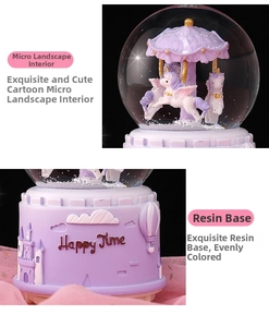 Detail of unicorn snow globe featuring a resin base with Happy Time relief and carvings