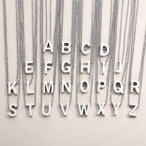 Collection of 26 stainless steel initial letter pendants on delicate chains