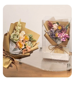 Miniature artificial rose bouquets in PVC gift box with rustic kraft paper and twine wrap
