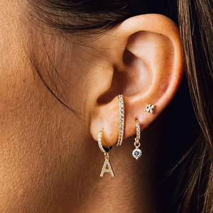 Gold-plated 26 letters earring set with zircon, featuring letter A dangle hoop and studs