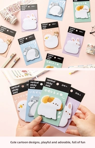 Detailed view of cute cartoon animal shaped sticky notes with adorable butt designs