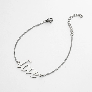 Detail view of the silver Love letter pendant with lobster clasp and adjustable chain