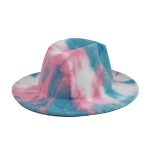 Detailed view of the vibrant blue and pink tie-dye pattern on the felt fedora hat