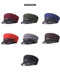 Flat top military beret display in seven colors with leather brim and gold buttons