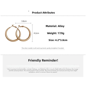 Detail view of matte gold C-shaped hoop earrings with precise size and weight dimensions