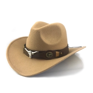 Detail of khaki wool felt cowboy hat featuring a leather band with silver bull head ornament