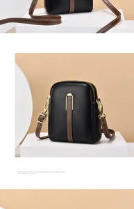 Close-up of vertical black PU leather phone bag with dual zippers and brown strap detail