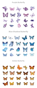Detail of vintage watercolor butterfly stickers in purple, blue and amber tones for scrapbooking