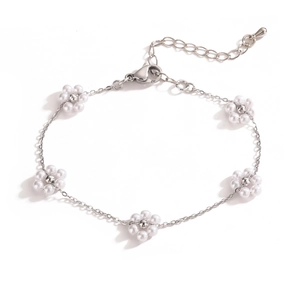 Silver chain bracelet with five white pearl daisy charms and adjustable lobster clasp closure
