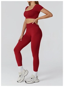 Deep red seamless yoga set with short sleeve crop top and high waist leggings for fitness