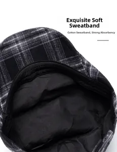 Detail of the vintage plaid cap showing the soft cotton inner sweatband and breathable mesh