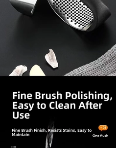 Close-up of stainless steel garlic press with ergonomic handle and easy-to-clean texture