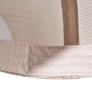 Macro view of breathable mesh lining and reinforced stitching on a baseball cap