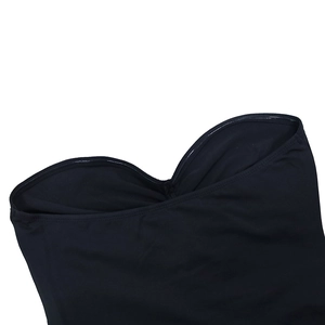 Detail of sweetheart neckline with anti-slip silicone strip on black strapless dress