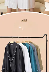 Close-up of lightweight robe fabric showing smooth vertical texture and color options