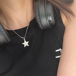 Minimalist star pendant necklace featuring a polished silver beaded chain for women