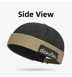 Close-up of color-block docker hat featuring vintage devifon letter patch embroidery