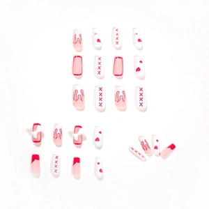Faux ongles adhésifs avec motif flamme rouge, cœurs et nœuds blancs en relief 3D
