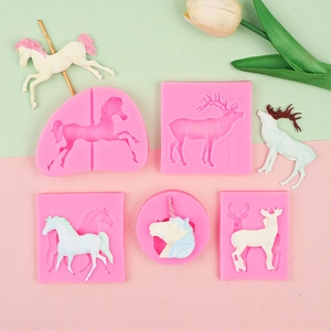 Detailed pink silicone molds for unicorn and carousel shaped fondant or soap crafts