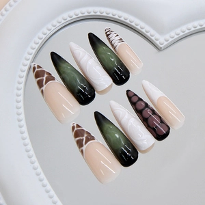 French press-on nails with hazelnut tones, zebra print, and 3D embossed texture