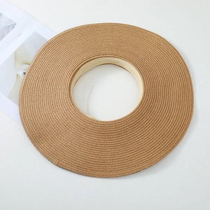 Women's summer straw visor with frayed edges and wide brim for beach sun protection