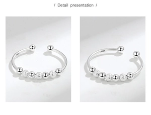 Detailed macro view of S925 sterling silver beads showing polished and matte finishes