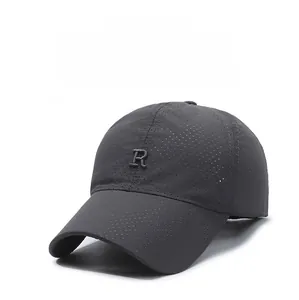 Detailed view of the breathable mesh texture and embroidered letter R on the baseball cap