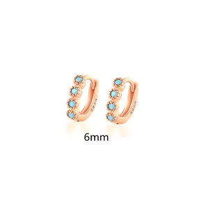 Detail view of 6mm rose gold S925 silver hoop earrings with small turquoise stones