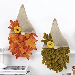 Pair of Thanksgiving faceless gnome wall hangings with maple leaf beards and sunflowers