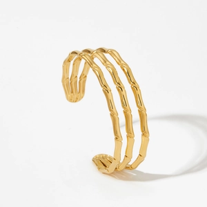 Three-layer bamboo style gold open cuff bracelet with vintage textured metal finish