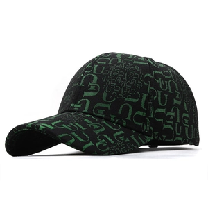Classic black baseball cap with vibrant neon green letter pattern for a trendy street look