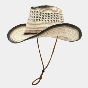 Detail of beige straw cowboy hat with distressed edges and studded leather belt