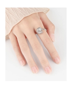 Close-up of adjustable silver star and moon spinner ring featuring sparkling crystals