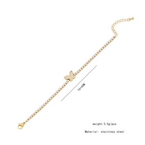 Detail of butterfly bracelet in gold stainless steel with shells and zircons, 16+4cm length