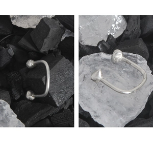 Macro shot of S925 sterling silver ring showing the certification hallmark and texture