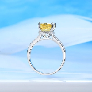 Classic silver ring with 8x10 yellow cushion cut carbon diamond and pave halo