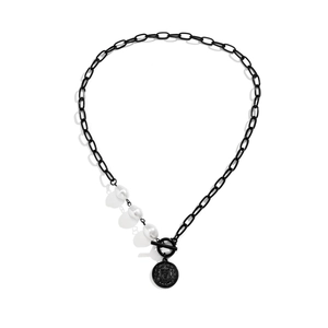 Men's necklace with black chain, white pearls and coin pendant on white background