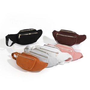 Collection of corduroy waist bags in six colors with dual gold zippers and adjustable straps
